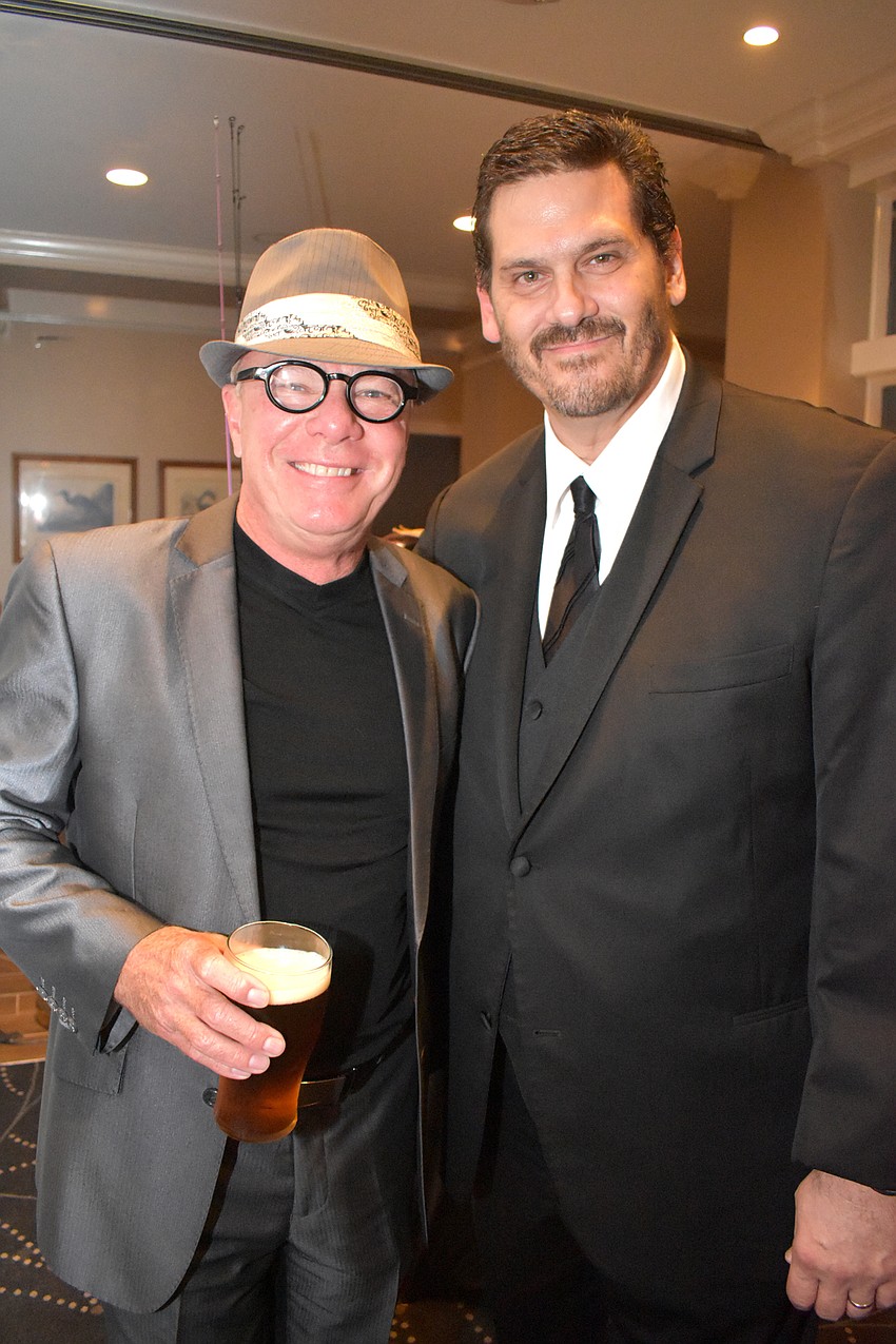 Event emcee Les McCurdy and board President David Sugar