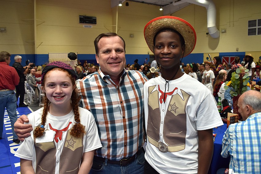 Emcee Lily with President and CEO Bill Sadlo and Emcee Jakobi