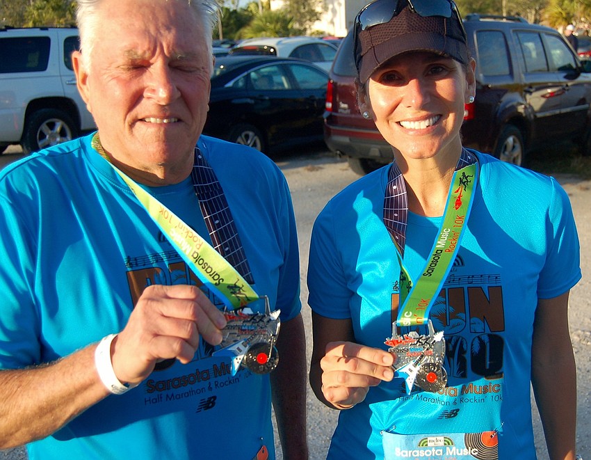 Lorenzo Daetz and Myriam Steinbaugh finished the 10K and collected their medals.