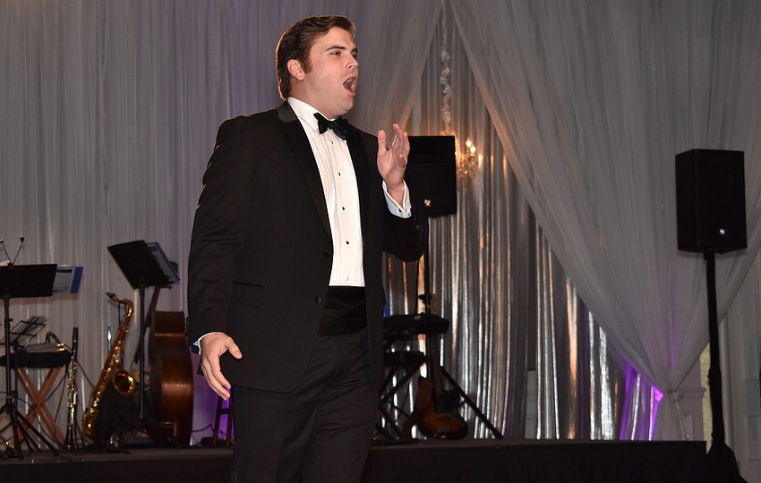 Andrew Surrena performs for guests.