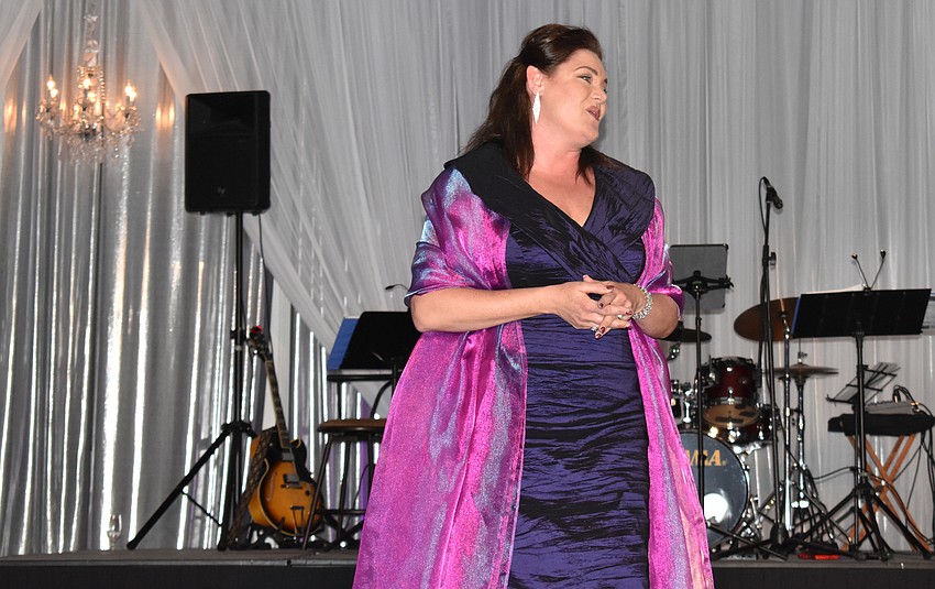 Kara Shay Thomson sings for guests.