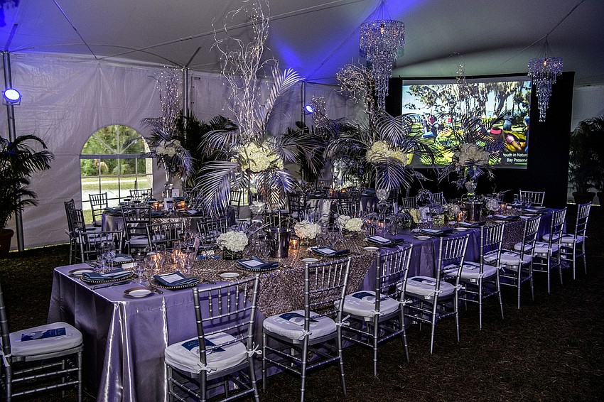 The room was decorated with beautiful tablescapes & fine dining by Michael’s On East.