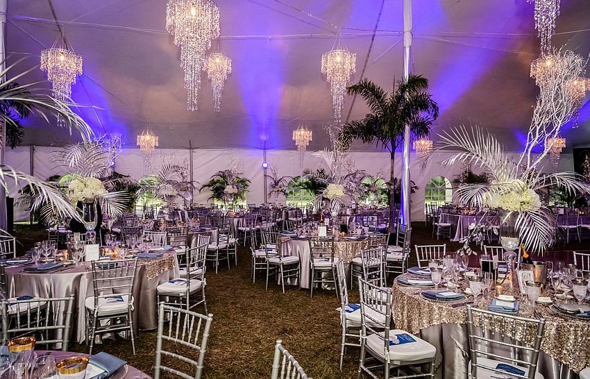 The room was decorated with beautiful tablescapes & fine dining by Michael’s On East.