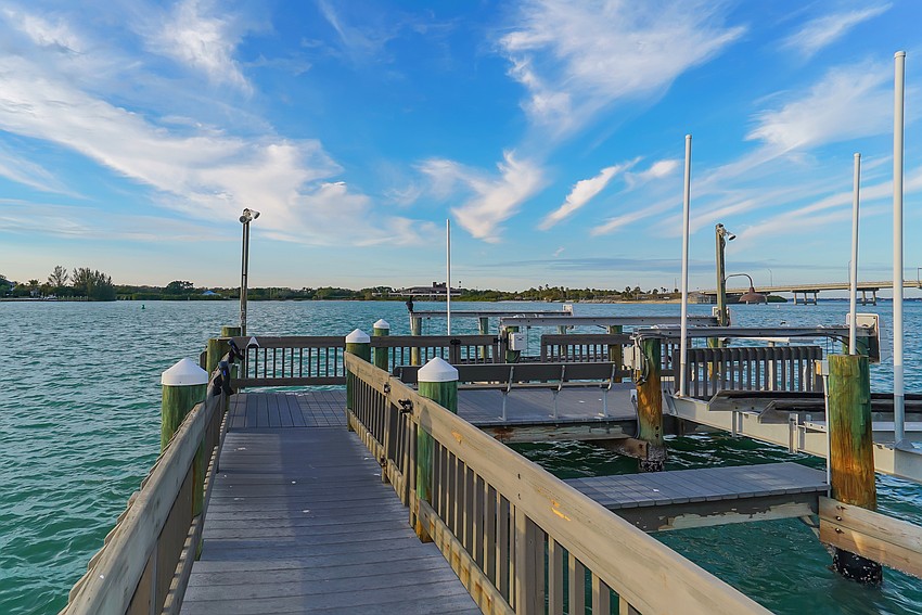 The dock can accommodate two boats and a jet ski.