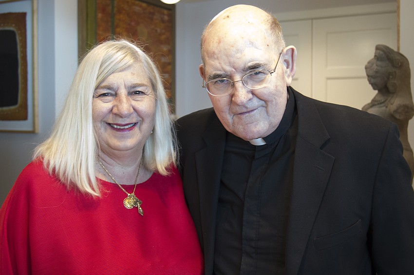 Women's Guild President Ginny Akhoury and Father Gerry Finegan