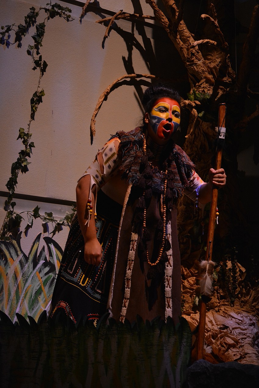Melissa Moore, as Rafiki, sets the stage for the show.