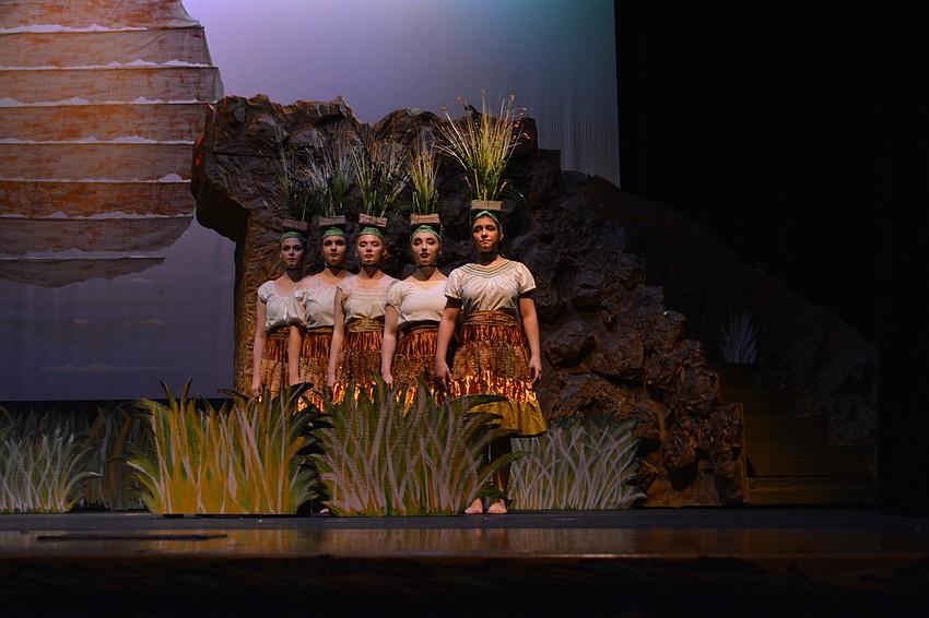 A grass chorus provides backdrop to Prideland scenes.