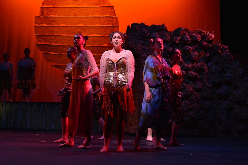 Nala, played by Olivia Lafemina, sings of how the Pridelands has turned to ruins in the song 