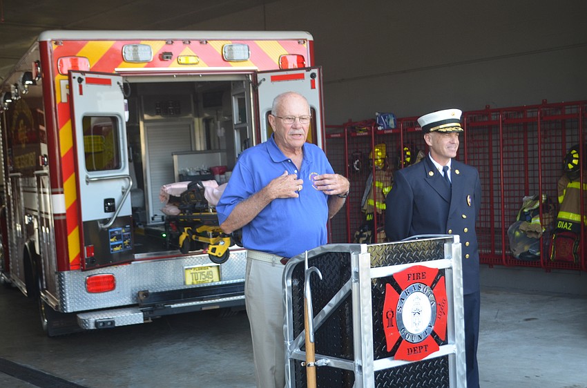 Siesta Key Fire and Advisory Council Treasurer Frank Jurenka addresses a group gathered for a ceremony to commemorate the group's donation to Fire Station No. 13.