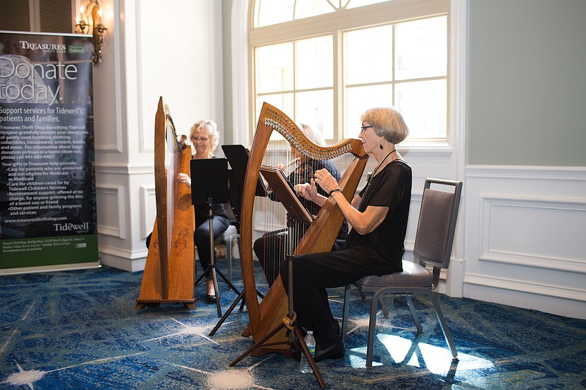 While guests entered the luncheon, Tidewell volunteers Kathy Donkus, Barbara Hornyak and Margi Miller played musical pieces.