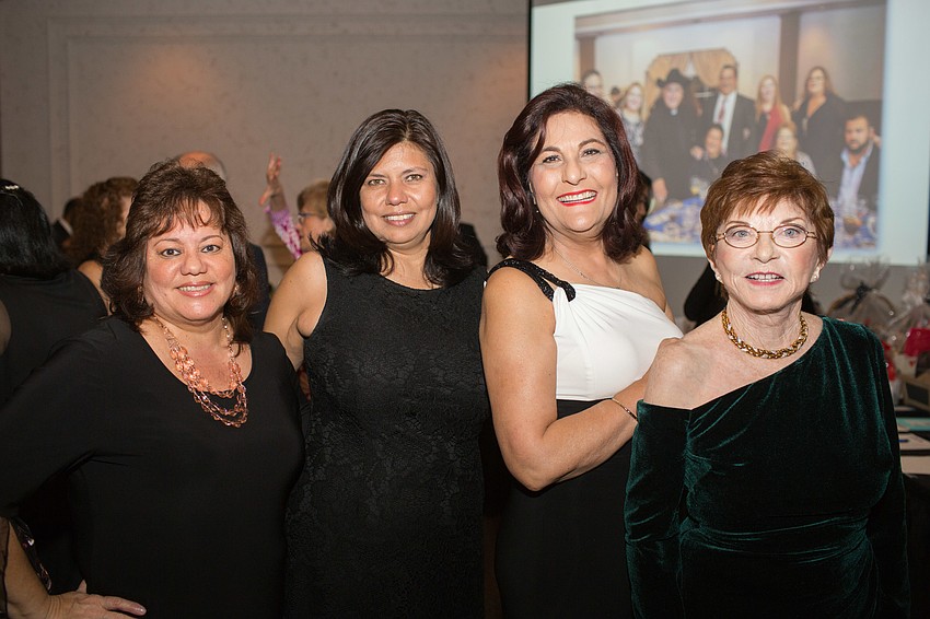 Co-Chairwoman Ivelisse Rivera, Wendy Barroso, Co-Chairwoman Maricarmen Romero-Vazmina and Kathy Schersten
