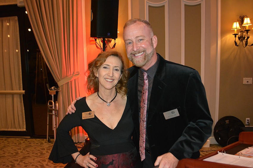 Players Managing Director Michelle Bianchi and Artistic Director Jeffery Kin get ready to address the crowd at the Smitten Gala.