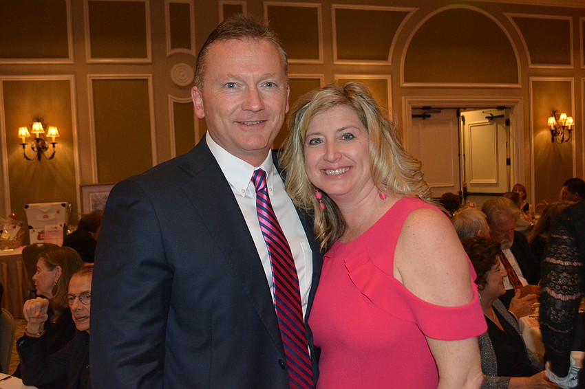 Clint Kasten and his wife, Heather Kasten, the executive director of the Lakewood Ranch Business Alliance, head to the dance floor at Smitten.