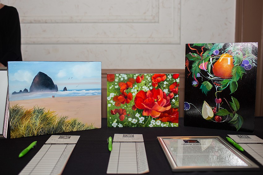There were multiple items available during the auction, including these paintings.