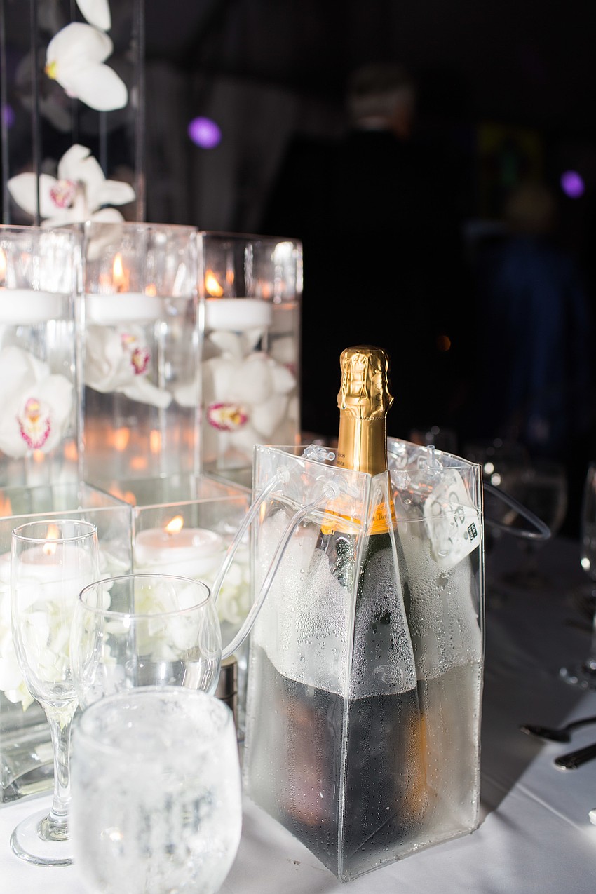 Each table had a bottle of champagne.