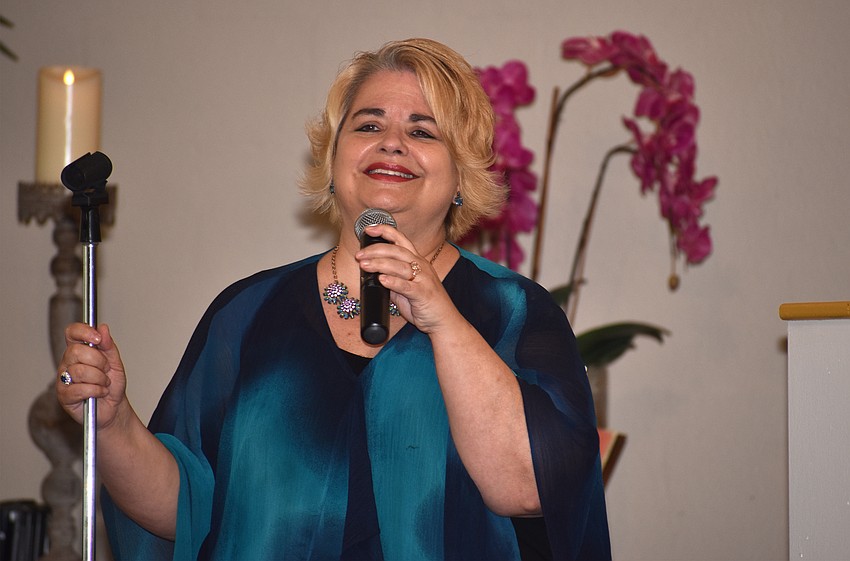 Judi Figel sings “My Romance” for the crowd.