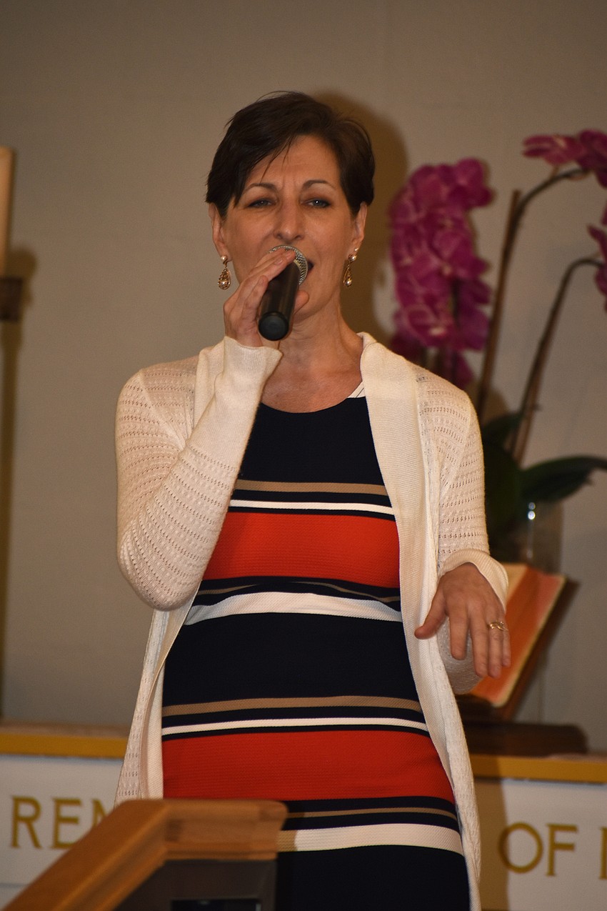 Martha Timke performs “God Bless the Child” during the performance.