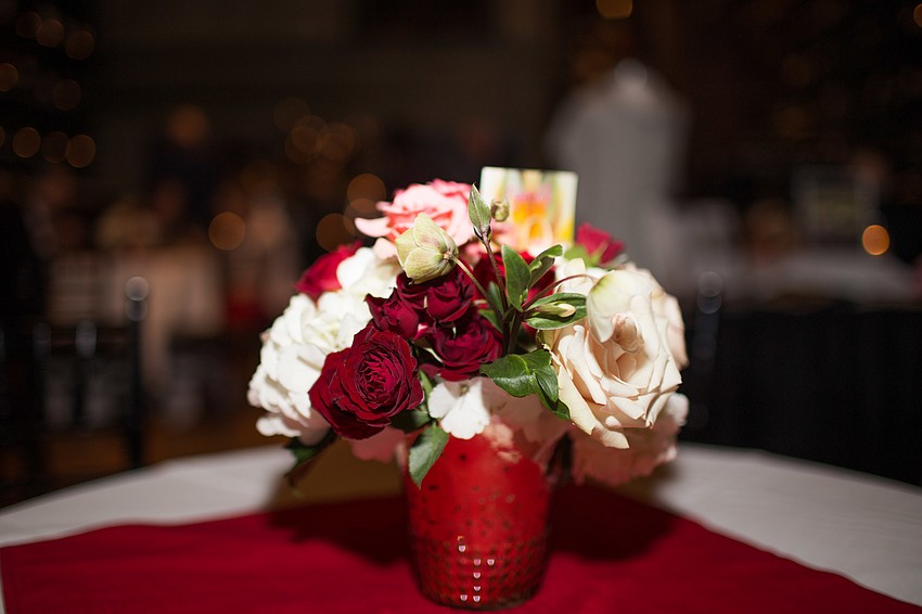 For Love In Bloom, it only makes sense to have red roses on the tables.