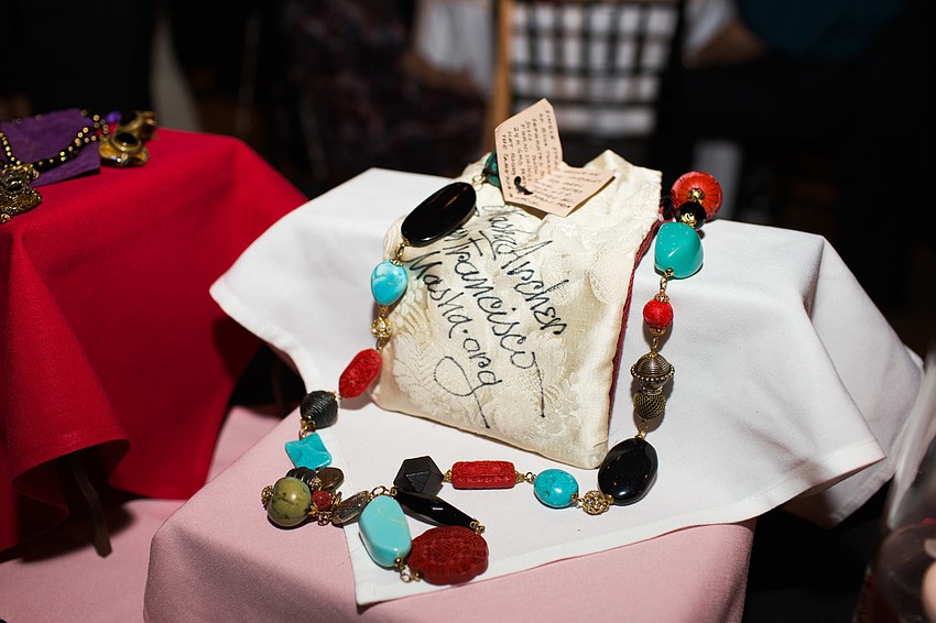 This Marsha Archer red cinnabar and turquoise necklace was available in the silent auction.