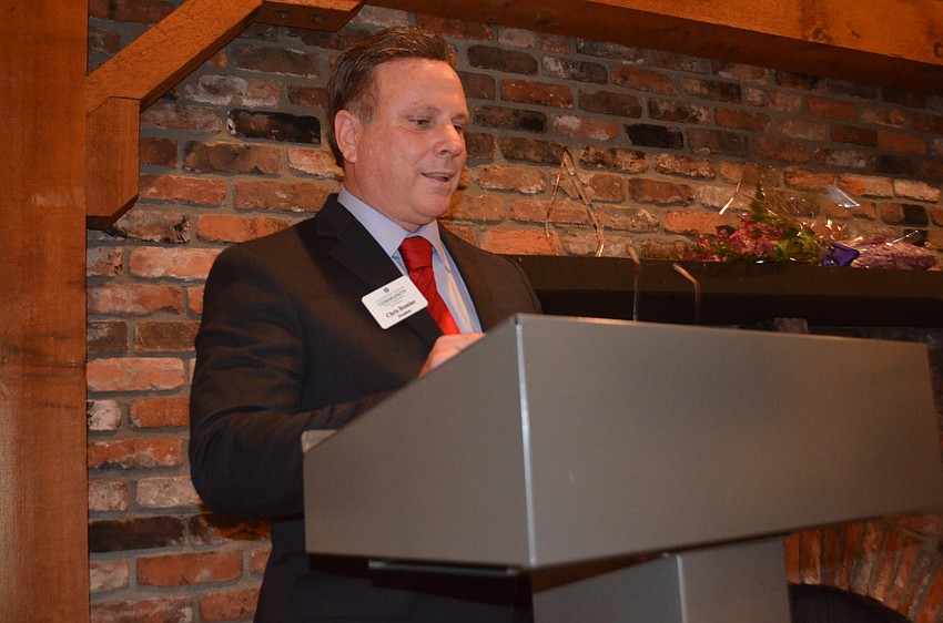 Chris Romine, the senior vice president of Northern Trust, opens the awards presentation.