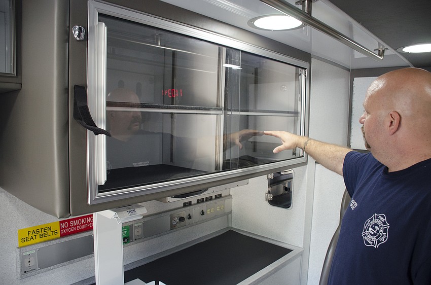 The walls of the patient cabin are lined with cabinets larger than those in the department’s two other rescue vehicles: about six inches taller.