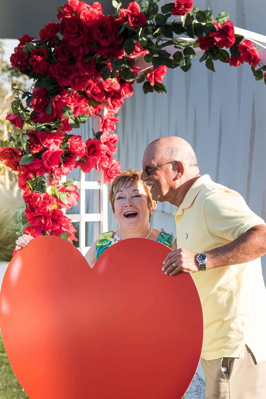 Kay and Rich Harris celebrate their fifth time renewing their vows at Siesta Key's wedding vow renewal ceremony.