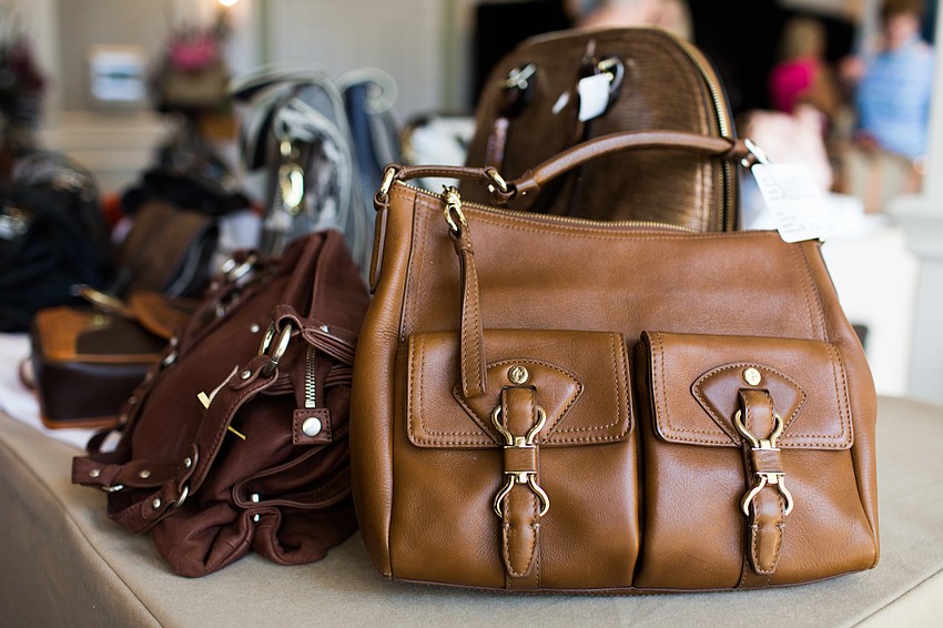 Designer bags of all shapes, sizes and colors were available for purchase.