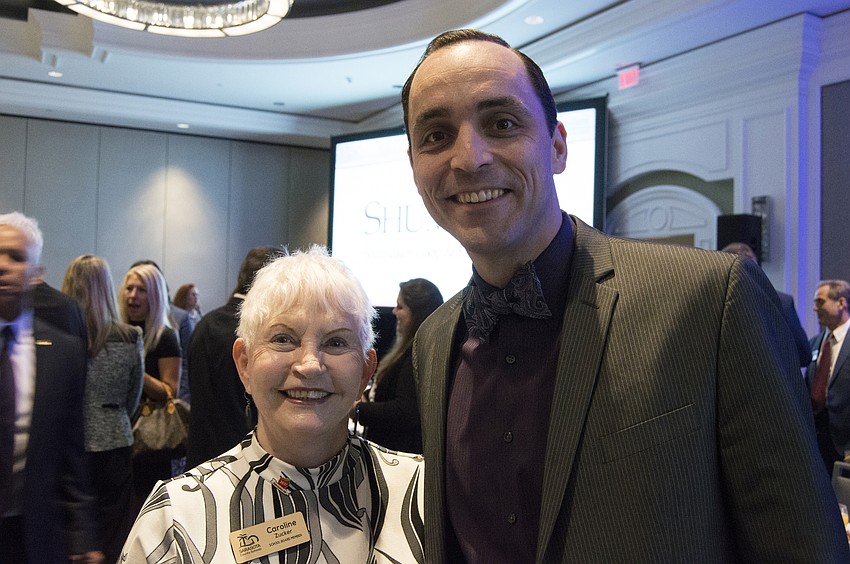 School Board Member Caroline Zucker and Chamber of Commerce President and CEO Kevin Cooper