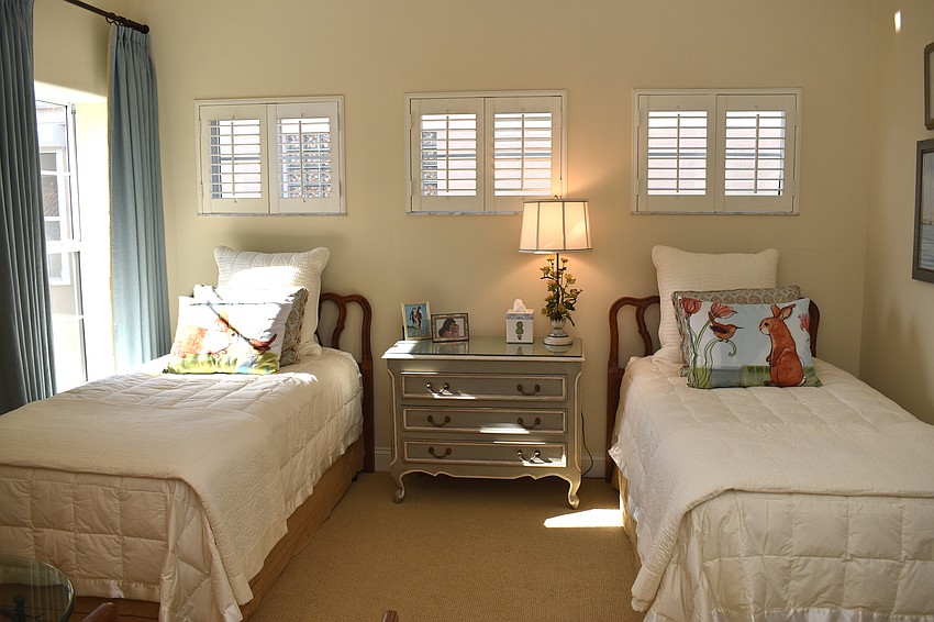 A guest bedroom offers extra sleeping space for guests.