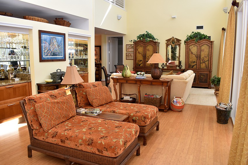 Two lounges and another sitting area complete the open living room.