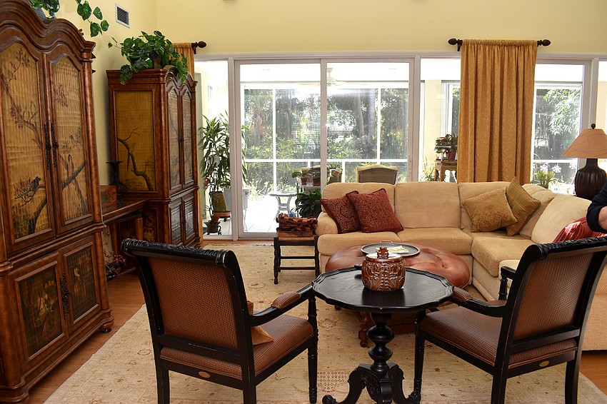 A second living room spools out onto a lanai.