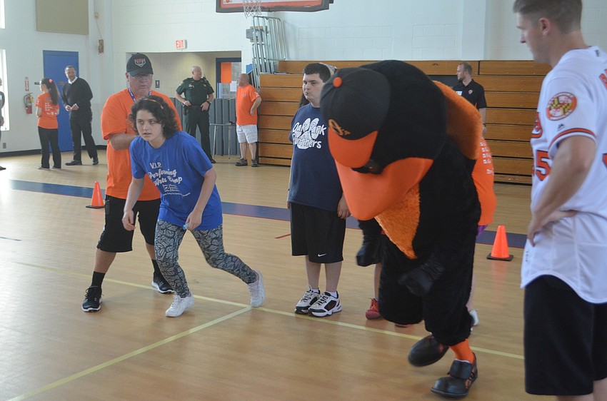 Sarah Kompothecras, an Oak Park School student, gets set to race against The Bird.