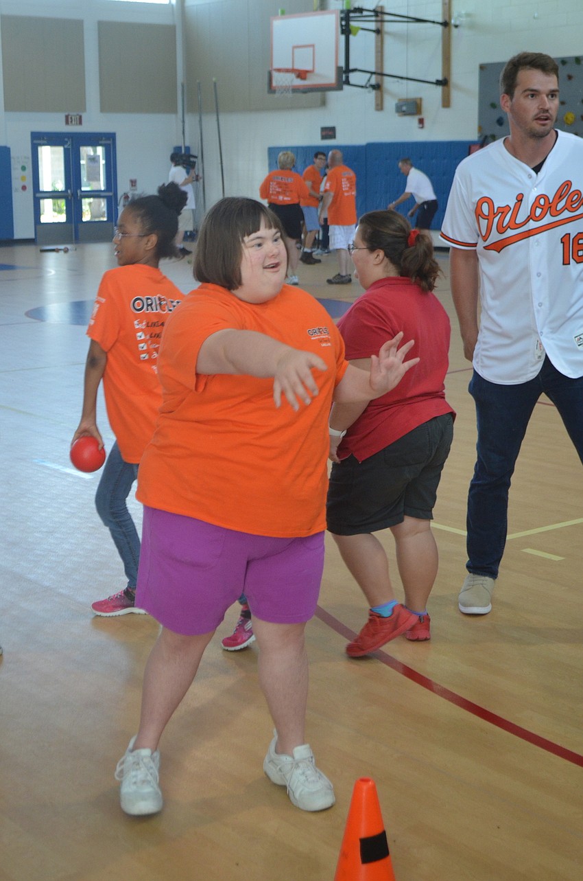Kylie Langa, an Oak Park School student, delivers a pitch.