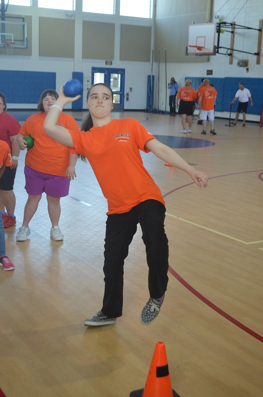 Winding up to pitch at a target, Oak Park School student Dejan Endriss gets ready to release the ball.