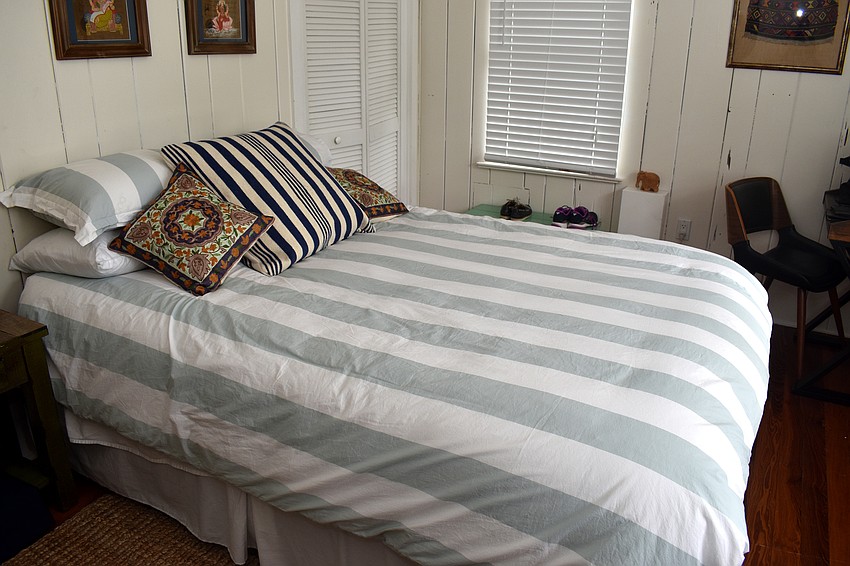 Two guest bedrooms have a shared bathroom.