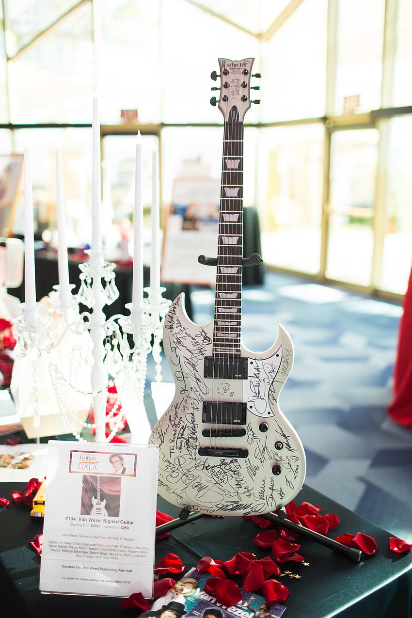 One of the auction items was a Barry Manilow signed guitar.