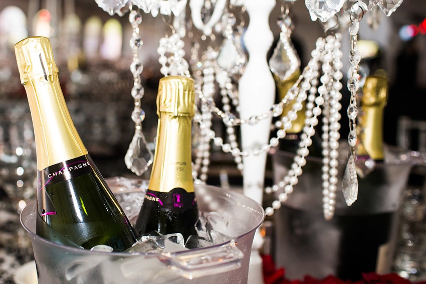 Champagne bottles were provided at each table.