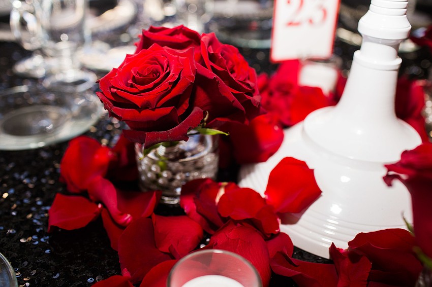 Red roses decorated the tables.