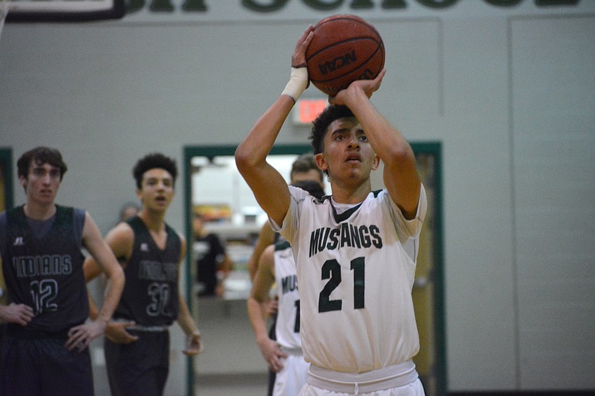 Evan Spiller shoots a free throw in the second quarter.