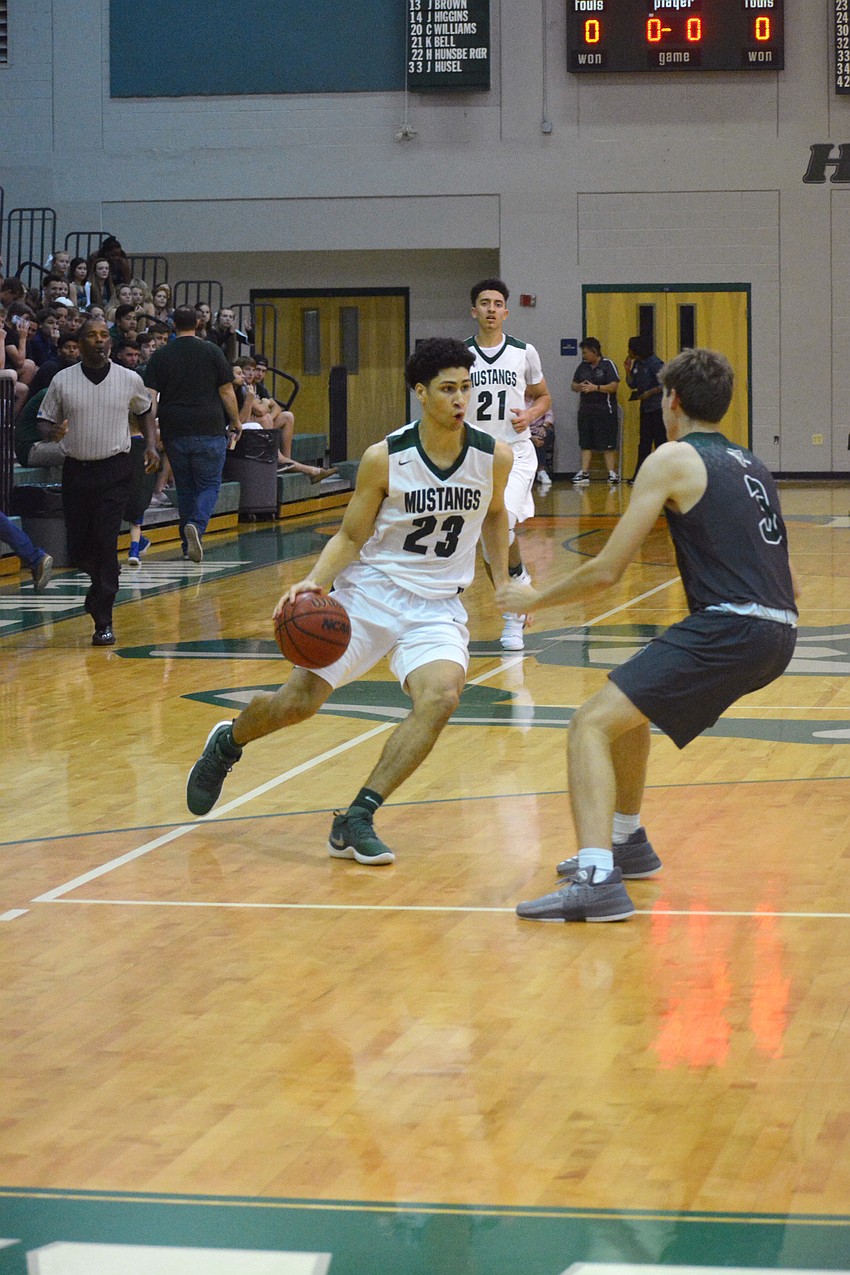 Christian Shaneyfelt dribbles around a Venice guard in the second half.
