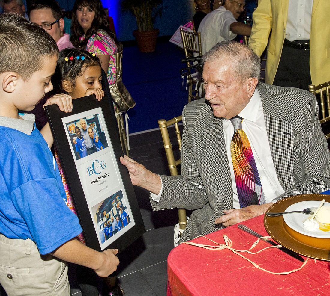 Sam Shapiro receives an award from the Boys & Girls Clubs of Sarasota County in 2015. File photo.