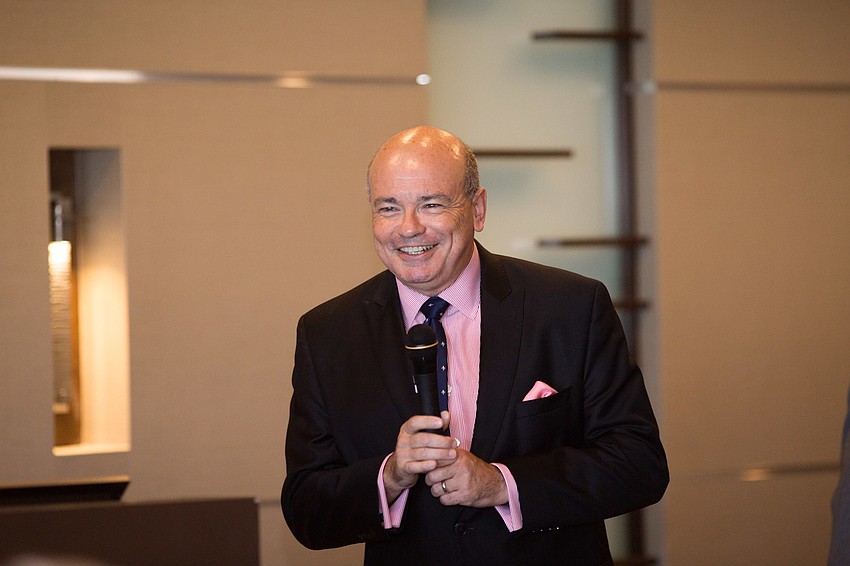 Executive Director Richard Russell thanks the patrons for coming to the luncheon.