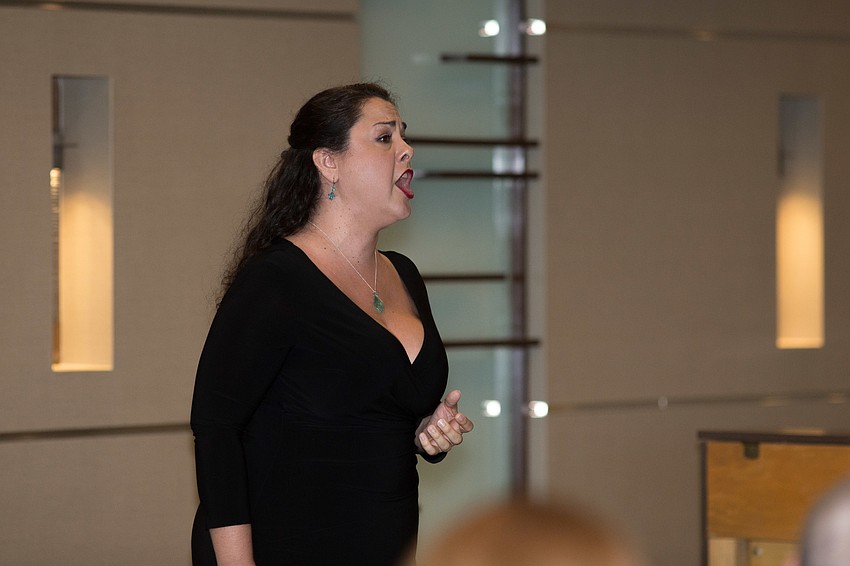 Lara Michole Tillotson performs for the audience.