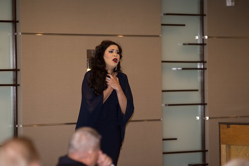 Zhanna Alkazova sings for the audience.