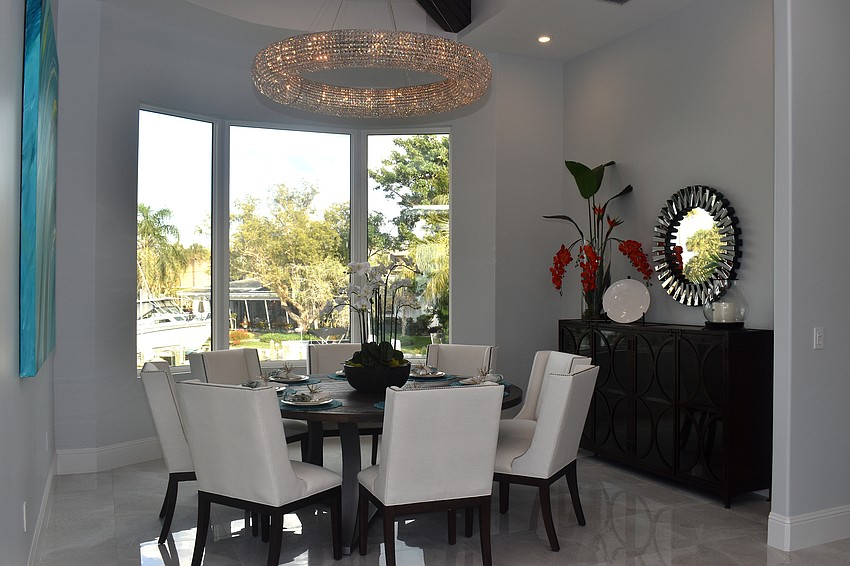 A dining room is one of the first rooms guests will see upon entering.