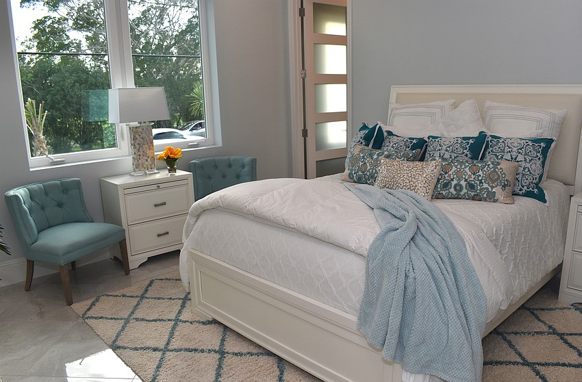 There are two guest bedrooms, both with bathrooms.