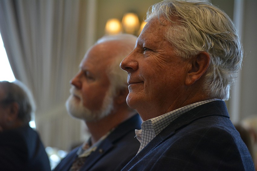 Lakewood Ranch Business Alliance Chairman Kim French listens intently to Neil Phillips' presentation.