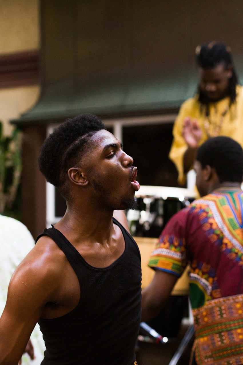 Westcoast Black Theatre Troupe members perform an authentic African dance and song during cocktail hour.