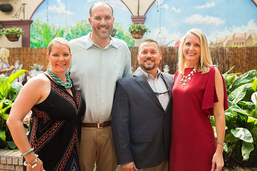 Amy and Josh Sankes with Doug and Jen Grosso