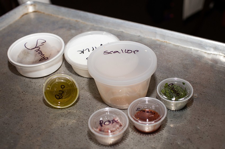 Ingredients for the first course included shrimp and scallops.